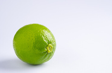 Green lime on white background.fresh lime.Lemon on white scene with copy space.