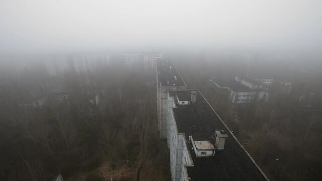 Over Pripyats Rooftops camera, dolly shot in chernobyl exclusion zone on rooftop.