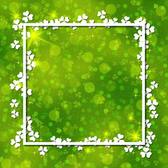 St.Patrick's Day green blurred vector background with clover leaves and white frame