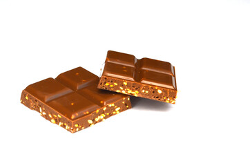 Milk chocolate bar with sesame seeds isolated on white background, sweets, dessert, sweet snack