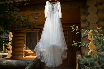 Wedding dress hanging in the street