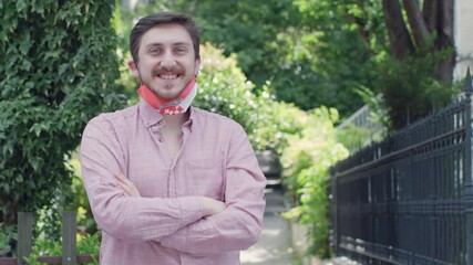 Virus and disease prevention concept. Portrait of an man wearing a protective medical mask and hard hat with the Croatia flag. Protection against coronavirus and other diseases. - Powered by Adobe