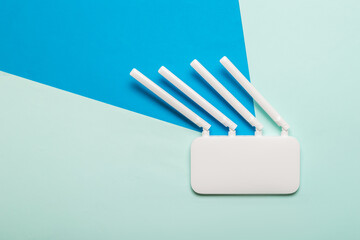 Wi-Fi router with tilted antennas in the direction of signal propagation.