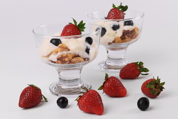 Home made yogurt with organic strawberry and grape on whity background