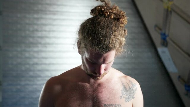 Tall slim shirtless caucasian man with long hair looks up at camera and clicks chawed fingers, smiles and laughs! Funny cut away from rock climbing session. 

1080P 25FPS 10bit SLOG2-REC709