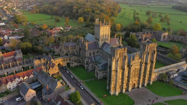 Aerial over Wells and Wells Cathedral, seat of the Bishop of Bath and Wells, Somerset, England
