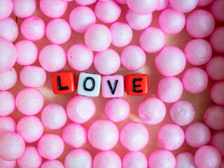 Love on blocks. Theme of love.  letter blocks. ., positive emotions. cubes with the word. An exclusive relationship.