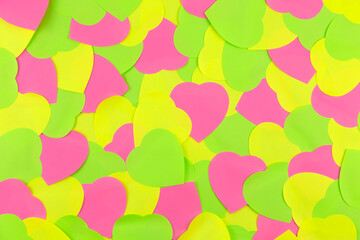 Closeup to Neon  sticky notes in heart form shape. Love in Valentine's Day Date Idea art concept