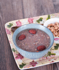 A bowl of eight treasures porridge in the plate