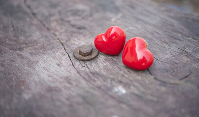 Fototapeta premium Red hearts on wooden with soft light