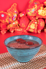 A bowl of Laba porridge on the festive background