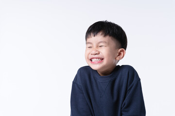 Asian boy with cute smile as happy kid concept