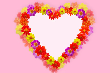 Heart shape made of various flower heads on pink background. Valentine's day.