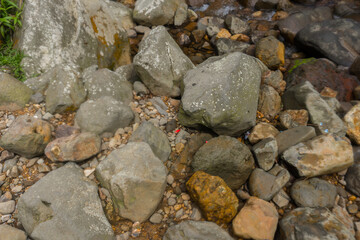 Photo of large rocks in the river