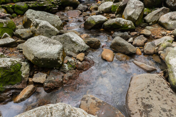 Fototapeta na wymiar Photo of large rocks in the river
