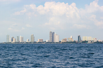 Fototapeta premium PATTAYA, CHONBURI, THAILAND -OCTOBER 21,2017 : Sea and tower building at Pattaya city thailand