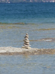 Fototapeta na wymiar stack of stones on the beach
