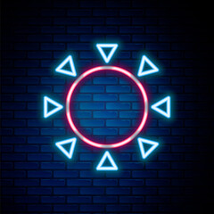Glowing neon line Sun icon isolated on brick wall background. Summer symbol. Good sunny day. Colorful outline concept. Vector.