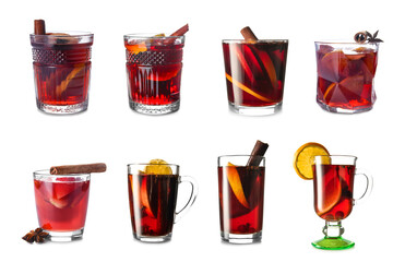 Glasses of tasty mulled wine on white background