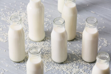 Bottles of rice milk on table