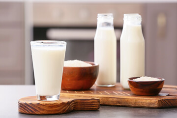 Obraz na płótnie Canvas Glass of rice milk on table