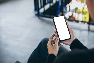 cell phone blank white screen mockup.woman hand holding texting using mobile on desk at office.background empty space for advertise.work people contact marketing business,technology