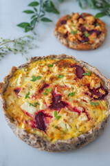 Fresh homemade tart with feta cheese and beetroot