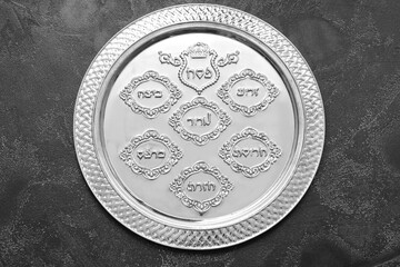 Passover Seder plate on dark background