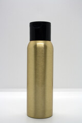 Gold bottles for cosmetics.