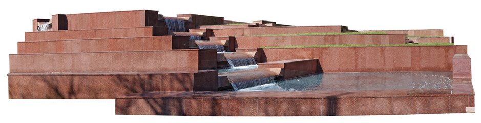 The city fountain is made of red granite in the form of steps isolated