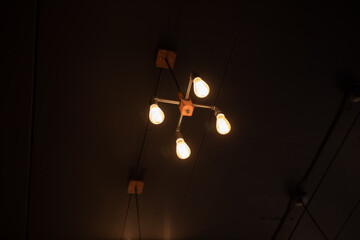Lighten ceiling light bulb indoor.
