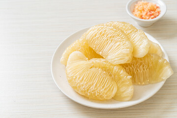 Fresh peeled pomelo, grapefruit or shaddock