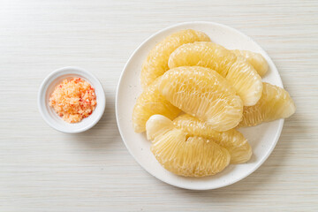 Fresh peeled pomelo, grapefruit or shaddock