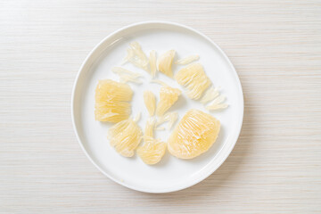 Fresh peeled pomelo, grapefruit or shaddock