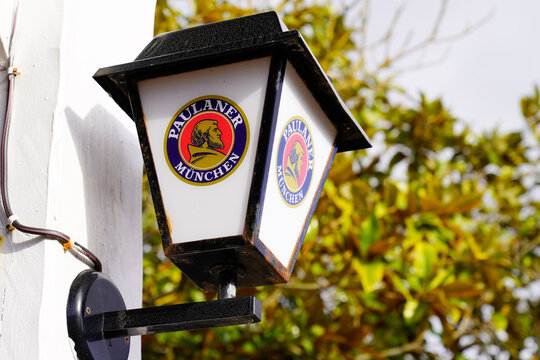 Paulaner lamp Beer text brand and logo sign front of Munich munchen beers pub restaurant