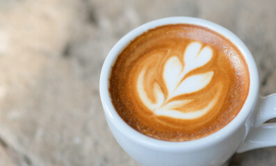 Close up shot of Heart shaped coffee latte.