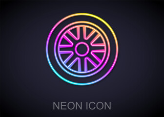 Glowing neon line Car wheel icon isolated on black background. Vector.