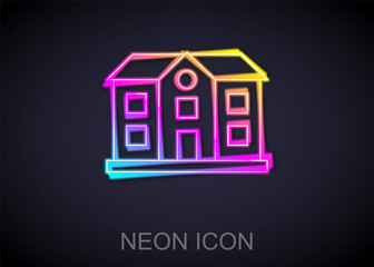 Glowing neon line House icon isolated on black background. Home symbol. Vector.