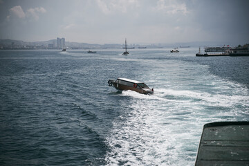 Watercraft cruising sea shore near Istanbul, Turkey