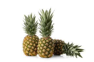 Fototapeta premium Tasty ripe pineapples isolated on white background