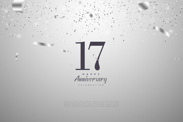 17th Anniversary background with falling silver ribbons.