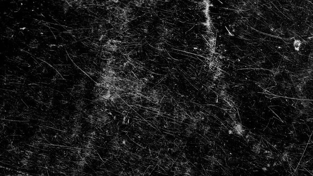 white scratches on a black background. The effect of old cinema. High quality FullHD footage