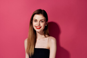 Fototapeta premium attractive woman red lips glamor luxury black dress pink background