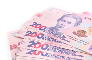 200 Ukrainian Hryvnia banknotes on white background, closeup