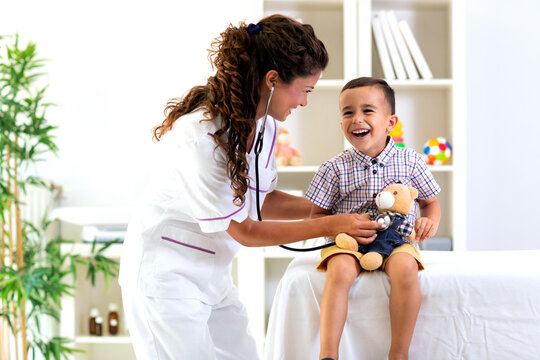 Doctor and her patient performing a stethoscope examination