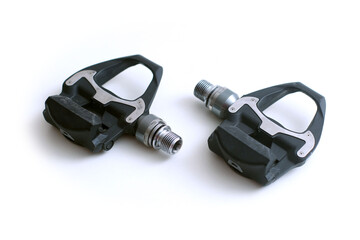 Modern bicycle pedals in different styles with clips isolated on white background.