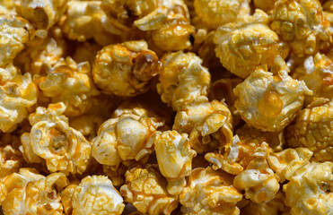 Popcorn with caramel -  food background. Selective focus.