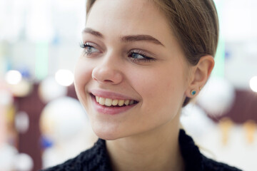 Portrait of beautiful positive woman