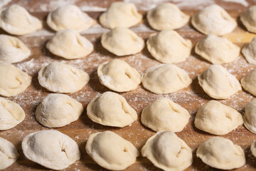 Dumplings making process, dough and minced meat