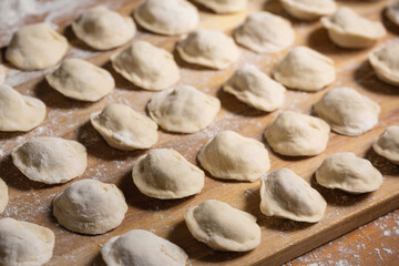 Dumplings making process, dough and minced meat